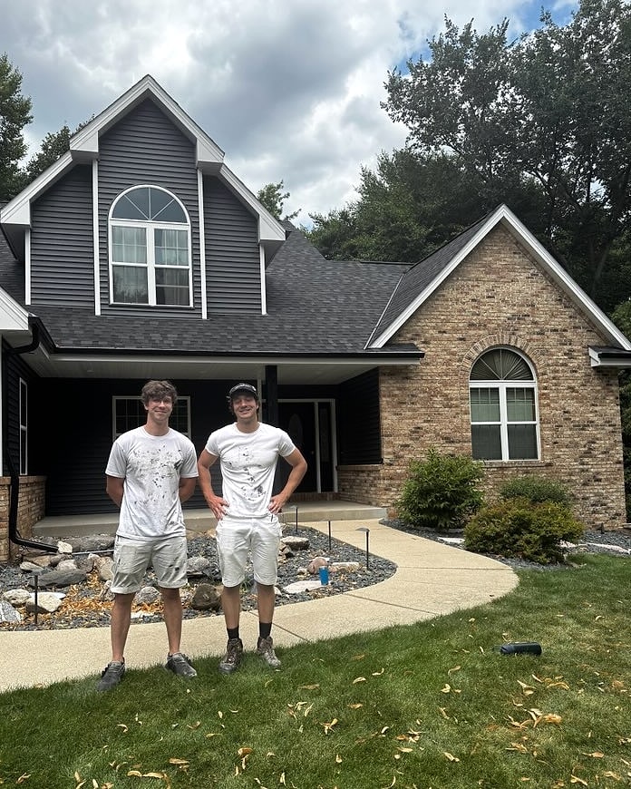 Albee Enterprises painters standing in front of a completed exterior painting project